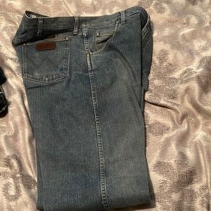 Wrangler 38x36 starched jeans has ink stain on one of the back pockets